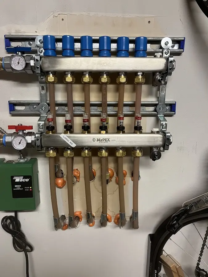 Plumber performing Water Heater Repair at a residential property in Salem